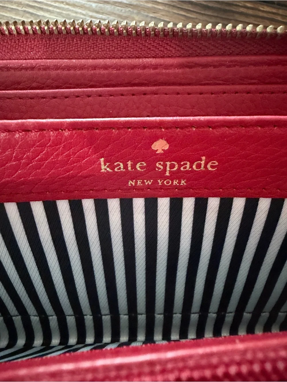 kate spade Red Pebbled Leather Zip Wallet with Bow Pull
